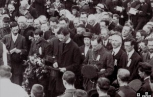 Pictured standing behind Pearse at the O'Donovan Rossa funeral