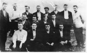 Patrick Tunney is the middle row, second from the left and his brother Michael Tunney is the back row, fifth from the left. It is believed this is a photograph of Mayo prisoners in the Curragh internment camp.